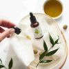 Witamina E, krople 30 ml: produkt konopny ubucha.pl Krople witamina E: etykieta z dawkowaniem i bazą oliwy z oliwek