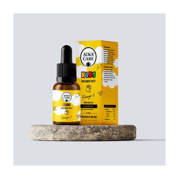 Aura Care Omega-3 dla dzieci: buteleczka z kroplomierzem obok pudełka na kamieniu Aura Care Omega-3 dla dzieci: buteleczka z kroplomierzem obok pudełka na kamieniu