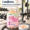 Słoik Creatine Gummies na ławce w siłowni, napis: bez proszku i szejkera, gotowa porcja w formie żelków
