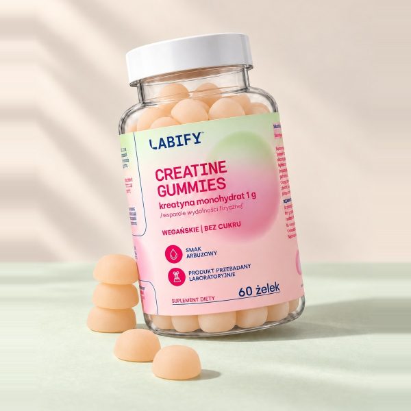 Creatine Gummies Labify: słoik 60 żelków z kreatyną i beżowe żelki o smaku arbuzowym obok