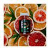 Żelki CBD Vegan 300mg 30szt - Orange: słoik żelków ułożony na plasterkach pomarańczy i grejpfruta Żelki CBD Vegan 300mg 30szt - Orange: słoik żelków ułożony na plasterkach pomarańczy i grejpfruta