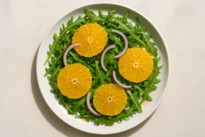 Salad with orange, arugula, and hemp seeds