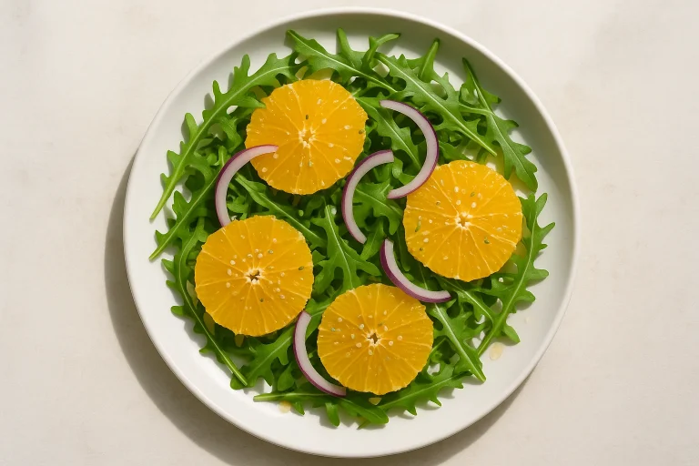 Salad with orange, arugula, and hemp seeds